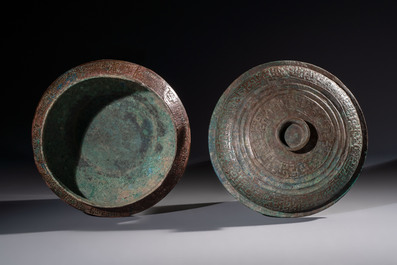A Chinese archaic bronze serving vessel and cover, Eastern Zhou/Spring and Autumn