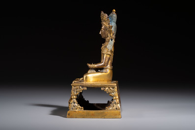 A Sino-Tibetan gilt-bronze figure of Buddha Amitayus, inscribed, Qianlong