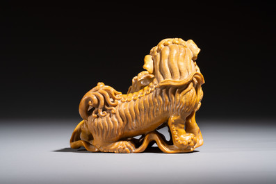 A fine Chinese soapstone group of Buddhist lions on wooden stand, 19th C.