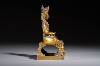 A Sino-Tibetan gilt-bronze figure of Buddha Amitayus, inscribed, Qianlong