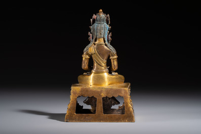 A Sino-Tibetan gilt-bronze figure of Buddha Amitayus, inscribed, Qianlong