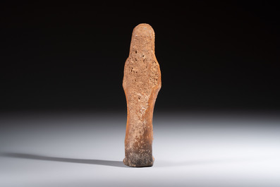 An Egyptian red-brown clay Ushabti, probably Romano-Egyptian, 1st C. AD