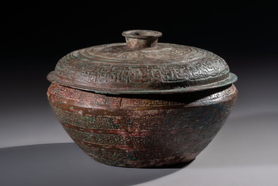 A Chinese archaic bronze serving vessel and cover, Eastern Zhou/Spring and Autumn
