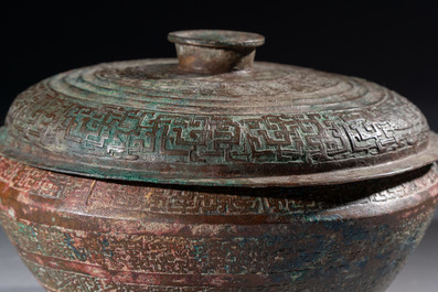 A Chinese archaic bronze serving vessel and cover, Eastern Zhou/Spring and Autumn
