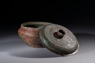 A Chinese archaic bronze serving vessel and cover, Eastern Zhou/Spring and Autumn