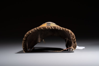 A rare Hopi leather Tuma Uyim Kachina mask, Arizona, Southwest United States, early 20th C.