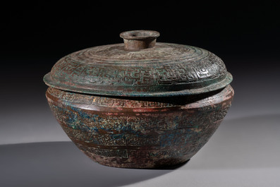 A Chinese archaic bronze serving vessel and cover, Eastern Zhou/Spring and Autumn