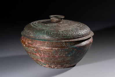 A Chinese archaic bronze serving vessel and cover, Eastern Zhou/Spring and Autumn