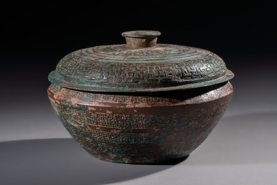 A Chinese archaic bronze serving vessel and cover, Eastern Zhou/Spring and Autumn