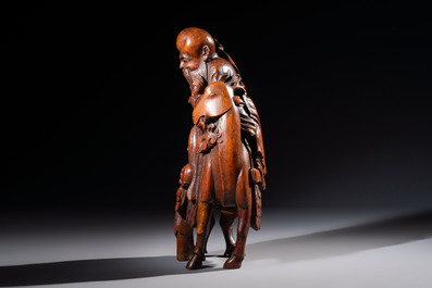 A large Chinese carved bamboo 'Shoulao' group, 19th C.