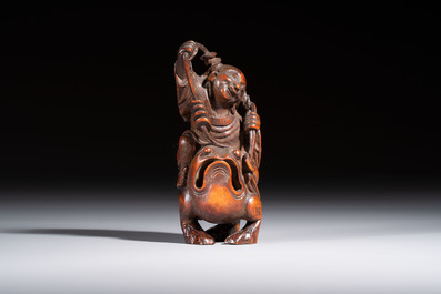 A small Chinese carved bamboo group of 'Liuhai', 19th C.