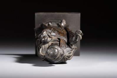 A Chinese bronze standing Guanyin with boy, Ming