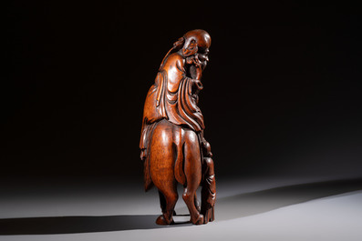 A large Chinese carved bamboo 'Shoulao' group, 19th C.
