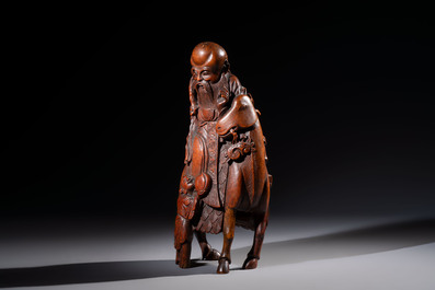 A large Chinese carved bamboo 'Shoulao' group, 19th C.