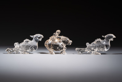 Three Chinese rock crystal sculptures on wooden stands, Republic
