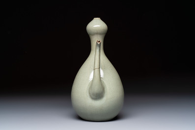 A Korean celadon-glazed ewer with twisted handle, 20th C.