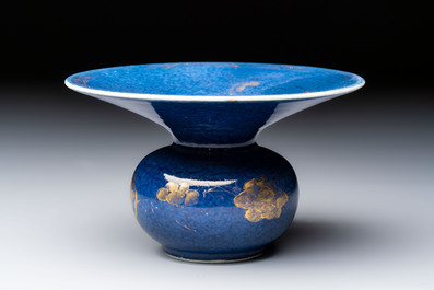 A Chinese powder-blue-ground gilt-decorated spittoon and two gilt-bronze-mounted vases, 18th C.
