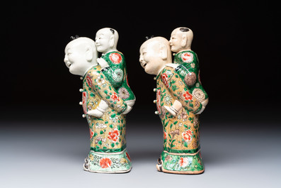 A pair of Chinese verte biscuit 'Piggyback Boys' groups, Kangxi