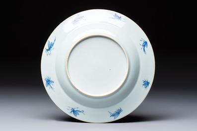 A Chinese blue and white 'La Dame au Parasol' plate after Cornelis Pronk, Qianlong