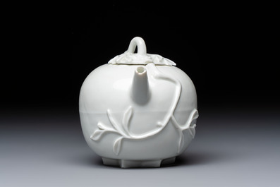 A Chinese Dehua blanc de Chine 'Pomegranate' teapot and cover, Kangxi
