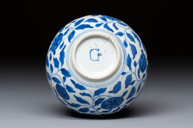 A rare Chinese 'G-marked' blue and white bottle vase with floral design, Kangxi
