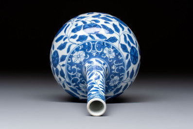 A rare Chinese 'G-marked' blue and white bottle vase with floral design, Kangxi