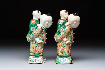 A pair of Chinese verte biscuit 'Piggyback Boys' groups, Kangxi
