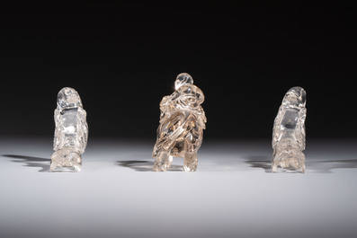 Three Chinese rock crystal sculptures on wooden stands, Republic