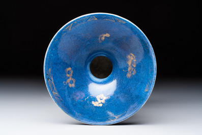 A Chinese powder-blue-ground gilt-decorated spittoon and two gilt-bronze-mounted vases, 18th C.