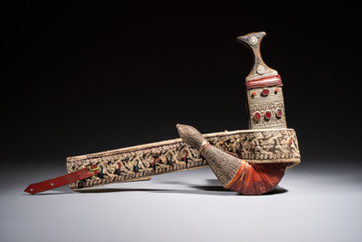 A Yemen jambiya-style dagger or &lsquo;asib&rsquo; with horn hilt and silver-plated mounts, and two African daggers, 19th/20th C.