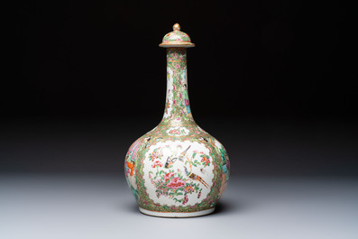 A Chinese Canton famille rose covered bottle vase and a teapot, 19th C.