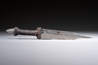 A Yemen jambiya-style dagger or &lsquo;asib&rsquo; with horn hilt and silver-plated mounts, and two African daggers, 19th/20th C.