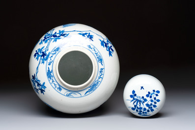 A Chinese blue and white 'Pheasants among Flowering Branches' jar and cover, 19th C.