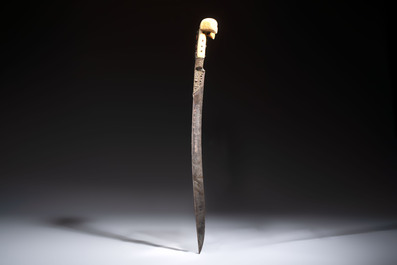 Two Ottoman yatagan swords, one with a silver scabbard, Turkey, 19th C.