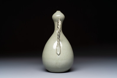 A Korean celadon-glazed ewer with twisted handle, 20th C.