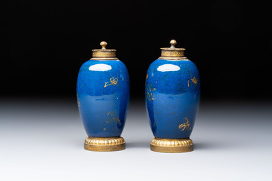 A Chinese powder-blue-ground gilt-decorated spittoon and two gilt-bronze-mounted vases, 18th C.