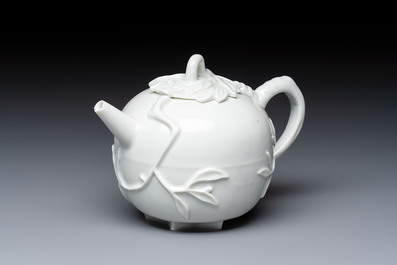 A Chinese Dehua blanc de Chine 'Pomegranate' teapot and cover, Kangxi