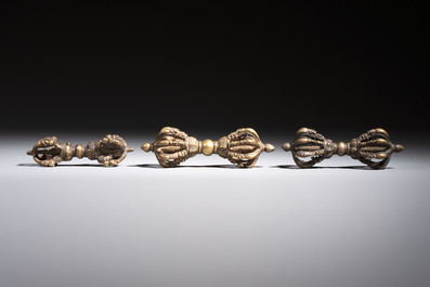 A varied collection of 14 Tibetan ritual utensils, 19/20th C.