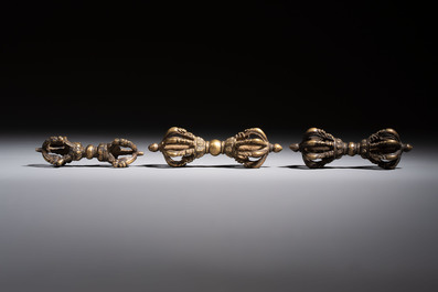 A varied collection of 14 Tibetan ritual utensils, 19/20th C.