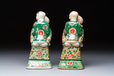 A pair of Chinese verte biscuit 'Piggyback Boys' groups, Kangxi
