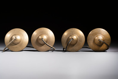 A varied collection of 14 Tibetan ritual utensils, 19/20th C.