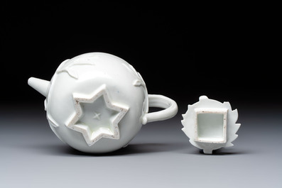 A Chinese Dehua blanc de Chine 'Pomegranate' teapot and cover, Kangxi
