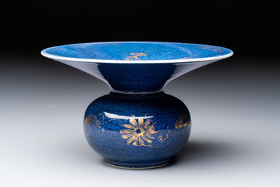A Chinese powder-blue-ground gilt-decorated spittoon and two gilt-bronze-mounted vases, 18th C.