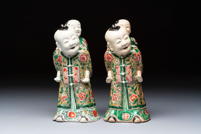 A pair of Chinese verte biscuit 'Piggyback Boys' groups, Kangxi