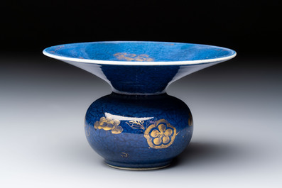 A Chinese powder-blue-ground gilt-decorated spittoon and two gilt-bronze-mounted vases, 18th C.