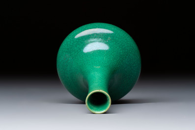A Chinese green crackle-glazed vase on wooden stand and two famille rose 'Roosters' and 'Antiquities' water pots, 19th C.