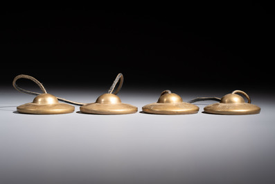 A varied collection of 14 Tibetan ritual utensils, 19/20th C.