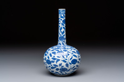 A rare Chinese 'G-marked' blue and white bottle vase with floral design, Kangxi