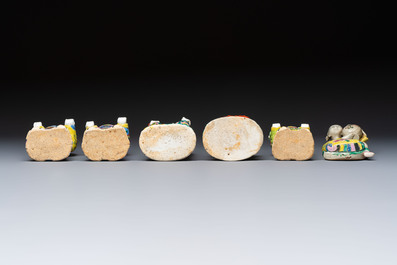 Six Chinese famille rose figures, one with a 'Lotus Throne' stand, 19th C.