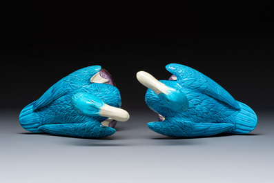 A pair of Chinese turquoise-glazed ducks and a pair of verte biscuit quail-form covered boxes, 20th C.